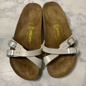 Birkenstock’s white leather sandals